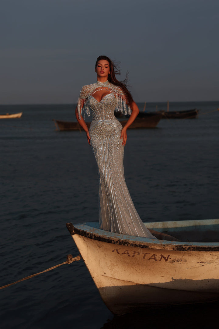 Delilah LD11596 Beaded Corset Sheath Gown with High Choker Collar and Crystal Fringe Shoulders - L.Blue front view