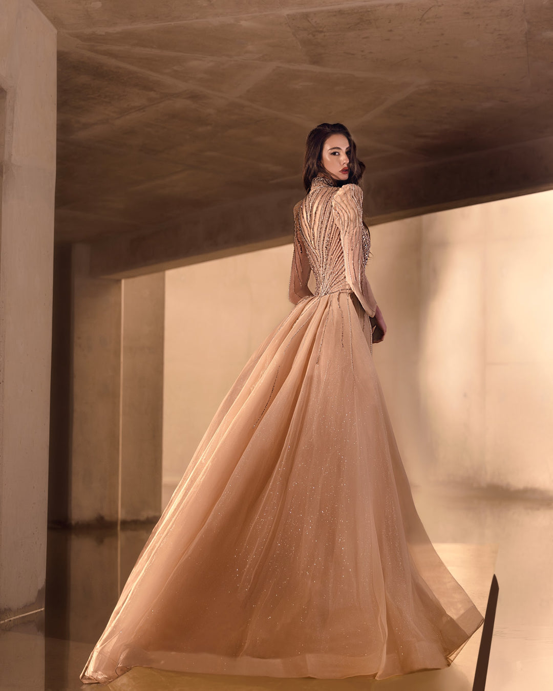 Delilah LD11650 High Collar Long Sleeve Crystal Sheath Gown with Tulle Overskirt - Champagne back view