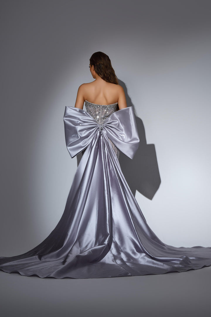 Delilah LD11486 Strapless Sweetheart Beaded Corset Sheath Gown with Oversized Back Bow Train - Grey back view