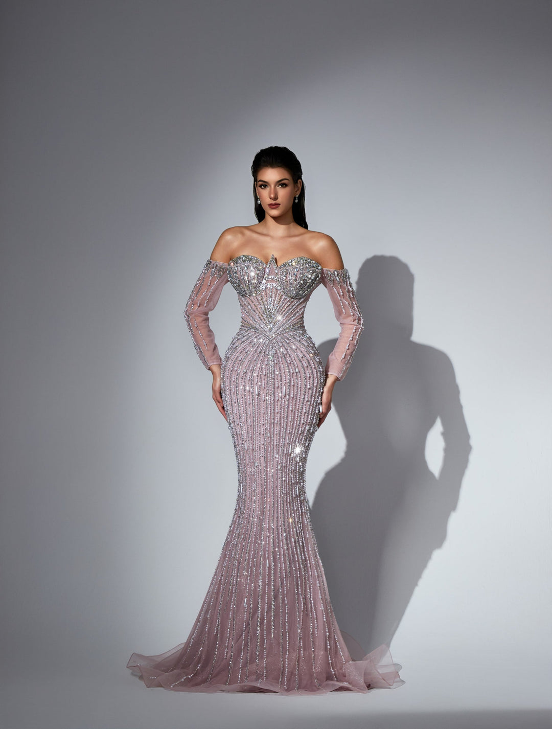 Delilah LD11539 Off-the-Shoulder Long Sleeve Beaded Corset Sheath Gown with Sparkle Overskirt - Pink front view