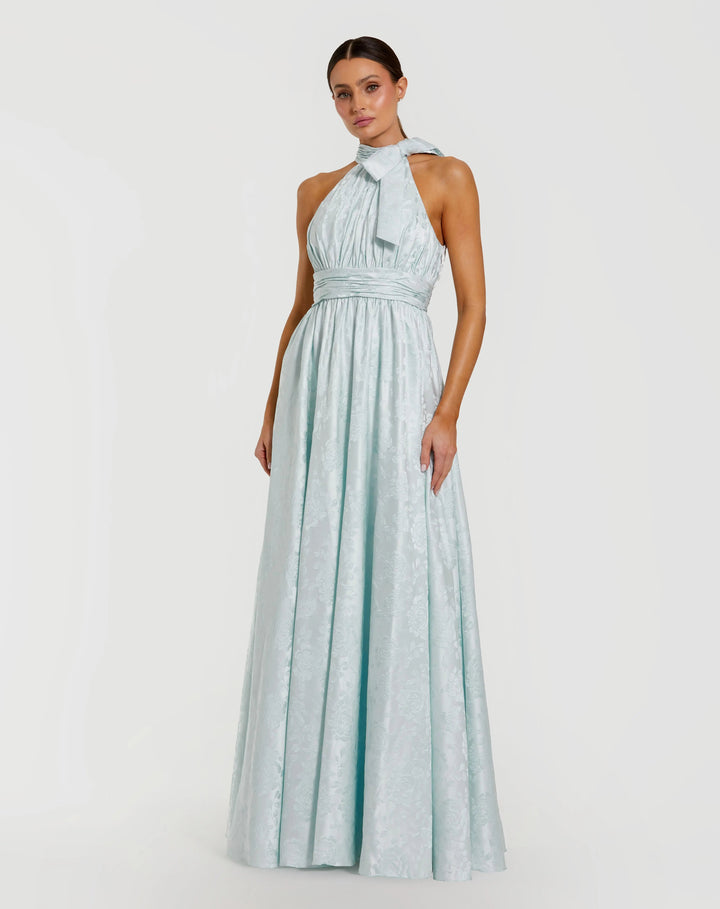 Blue Sleeveless Halter Neck Brocade Gown With Bow Detail - FOSTANI.com